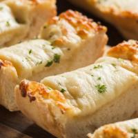 Plaza Cheese Bread · Our freshly baked breadsticks with melty cheese and our blend of Italian seasonings. Served ...