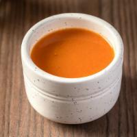 Roasted Tomato Soup · Roasted tomato, Italian herbs, touch of roasted garlic.