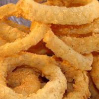 Onion Rings · Hand-breaded and dipped in   our lightly seasoned batter. Served with ranch  dressing.