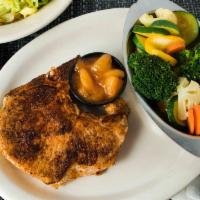Pork Chops · A pair of juicy center cut, bone-in pork chops grilled just right.   Served with Saucy Cinna...