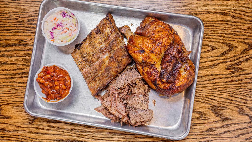 Rotisserie Trio (Feeds 2-3) · Rotisserie 1/2 chicken, 1/2 rack ribs, and1/2 pound of pulled pork or brisket! (feeds two or three)
