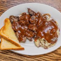 Beef Tips With Mashed & Gravy · Tender Rib Eye steak bites, seasoned and cooked over a wood fire. Served with homemade mashe...