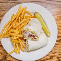 Chicken Bacon Ranch · Rotisserie chicken with provolone cheese, bacon, lettuce, tomato, and ranch! Served as a wra...