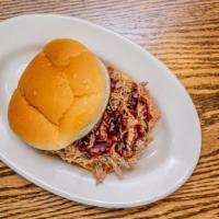 Pulled Pork  Sandwich · Just our delicious rotisserie pulled pork on a round bun!
(No Fries  or Sides)