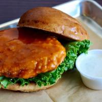 Buffalo Chicken Sandwich · Breaded and fried, crispy chicken breast, tossed in our house made buffalo sauce and served ...