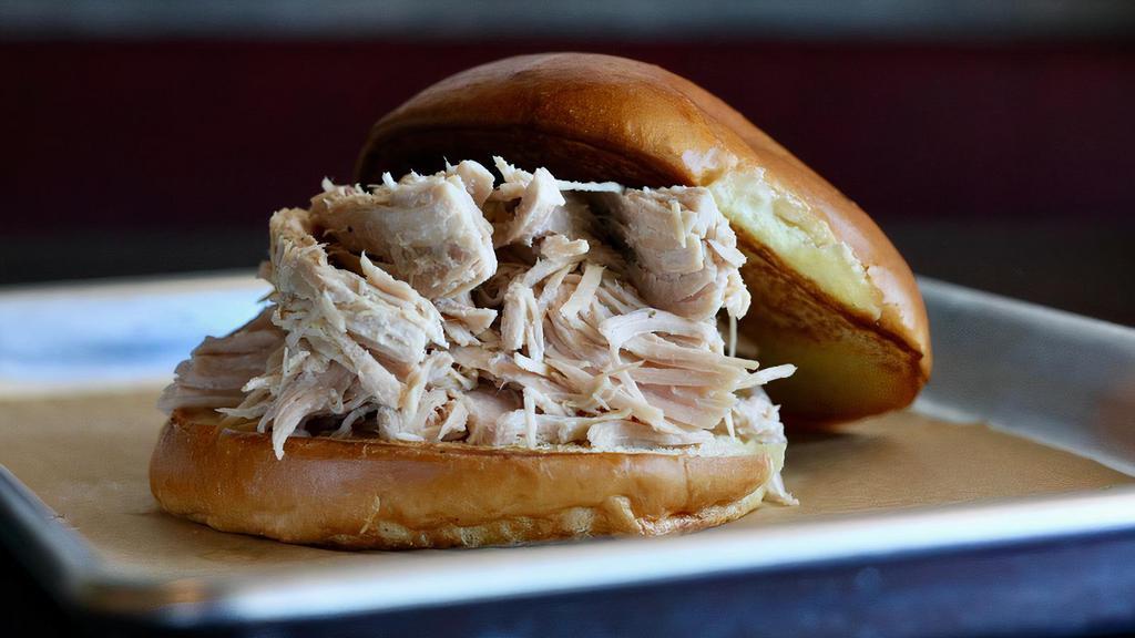 Turkey · Slow roasted turkey breast, piled high on a white roll.