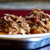Open Face Brisket · Served with mashed potatoes and gravy.