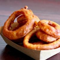 Onion Rings · Thick cut, beer battered onion rings.
