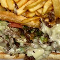 Philly Steak Sub · Thinly sliced steak on a sub roll topped with grilled onions, green peppers, Swiss cheese, l...