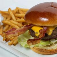 Gourmet Bacon Cheese Burger · 1/2 pound akaushi wagyu beef with American Cheese & crisp bacon on a brioche bun with lettuc...