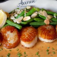 Sea Scallops · Green beans, almonds, and lobster butter.