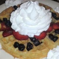 Fresh Strawberry Waffle · Topped with fresh strawberry sauce and whipped topping.