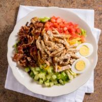 Chicken Cobb Salad · With grilled chicken breast, bacon, lettuce, tomatoes, hard boiled egg and cheddar cheese.
