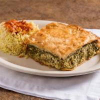 Spinach Pie · Thin layers of phyllo dough filled with a mix of fresh spinach and feta cheese, served with ...