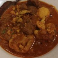 Gobi Lamb · Lamb cooked with fresh cauliflower, ginger and authentic Indian spices.