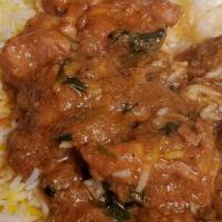 Chicken Curry · Boneless chicken cooked authentic Indian spices.