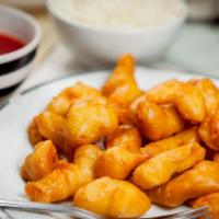 Sweet & Sour Chicken 甜酸鸡 · Served with white rice.