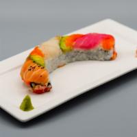 Rainbow Roll · Crab stick, avocado, cucumber, tuna, fresh salmon, amberjack, and masago.