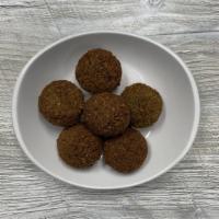 Falafel /  فلافل · Deep fried vegetable patty of chickpeas and parsley mixed with our special blend of spices.