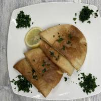 Arayes /   عرايس · Pita bread loaded with seasoned kufta Kabob meat  , grilled on a griddle with some olive oil...