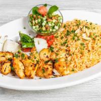 Chicken Shish Tawook / شيش طاووق - Platter · Marinated chicken breast cubes charbroiled to perfection, served with grilled veggies. (two ...