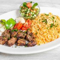 Shish Kabob /  شیش کباب- Platter · Marinated beef cubes charbroiled to perfection, served with grilled veggies. (two skewers). ...