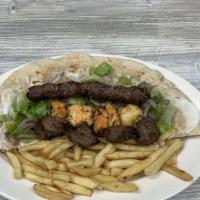 Mixed Grill Wrap · 1 skewer of each:  Shish kabob, chicken shish tawook, and kufta kabob.
And each meal  comes ...