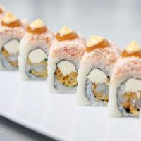 Spicy Crab N' Shrimp Roll · shrimp tempura, spicy jalapeño, cream cheese, topped with succulent crab, finished with a ri...