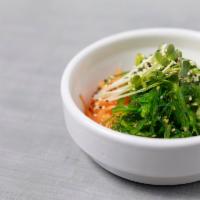Seaweed Salad · fresh seaweed and cucumbers, carrots, topped with sesame seeds and seasoned vinegar