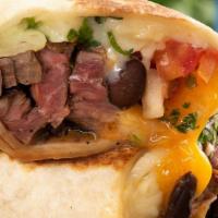 Steak Burrito · A burrito filled with our amazing marinated steak, rice, & beans, wrapped in a flour tortill...