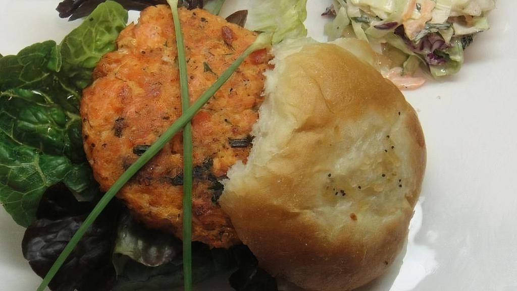Crab Cake Sandwich · Lump crab cake on a toasted brioche bun with lettuce, tomato & special Dive sauce & side of  coleslaw