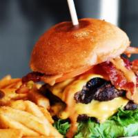 Sonora Burger · Contain gluten. Double patty, American cheese, lettuce, chipotle crema, sonora sauce and bac...