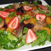 Strawberry Chicken Salad (Large) · Iceberg lettuce, grilled chicken, fresh strawberries, walnuts, mandarin oranges, with raspbe...