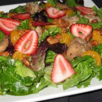 Strawberry Chicken Salad (Small) · Iceberg lettuce, grilled chicken, fresh strawberries, walnuts, mandarin oranges, with raspbe...
