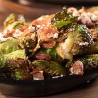 Roasted Brussels Sprouts · Goat and feta cheese, bacon bits, lemon.