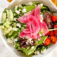 House Salad · Mixed greens, tomatoes, cucumber, marinated artichokes and pickled red onions served with a ...