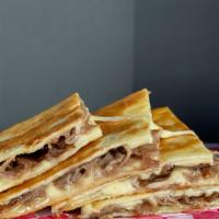 Steak Quesadilla · Seasoned and Griddled Flank Steak with Chihuahua Cheese in a Flour Tortilla