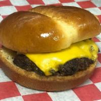 Single Burger · Single 4 oz. homestyle all beef patty with American cheese on a brioche bun.