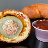 Porky Dill Dough · Cored Dill Pickle stuffed with Hickory Smoked Pork, rolled in a Cheddar and Bacon infused Do...
