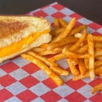 Half Og · American and Cheddar Cheese Spread on Texas Toast. Served with Tomato Soup Dip.