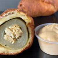 Chiki Dill Dough · Cored Dill Pickle stuffed with Shredded Roast Chicken, rolled in a Nashville Spiced Dough th...