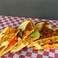 Veggie Quesadilla · Tomato, Onion and Peppers with Chihuahua and Cheddar Cheeses in a Flour Tortilla