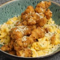 Fried Lobster Mac & Cheese  · Fried langistino lobster tails over creamy mac and cheese