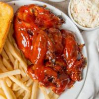Bbq Chicken Dinner · Chicken dinners are half chickens topped with our Grecian sauce or BBQ sauce, a side of cris...