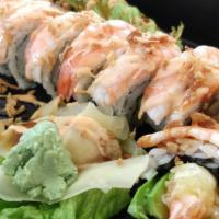 Tiger Roll · Cooked, spicy level 1. Fried tempura shrimp, English cucumber, organic avocado, topped
with ...