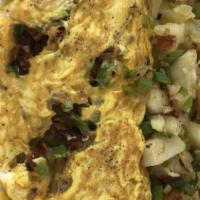 Western Omelet · Our great ham with onions, green peppers, and American cheese.
