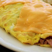 Meat Lovers Omelette · Bacon, sausage and ham with your choice of cheese