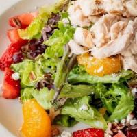 Sanibel Salad · Grilled Chicken breast served on mixed greens, accompanied by fresh strawberries, Mandarin o...