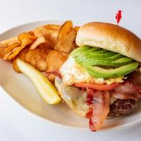 Iron Man Burger · Chipotle mayo, pepper jack cheese, avocado and grilled tomato with fried egg.