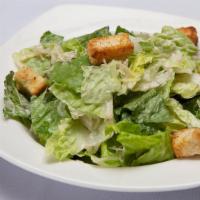 Caesar Salad · Romaine lettuce tossed with our house-made Caesar dressing, shaved Parmesan cheese and garli...